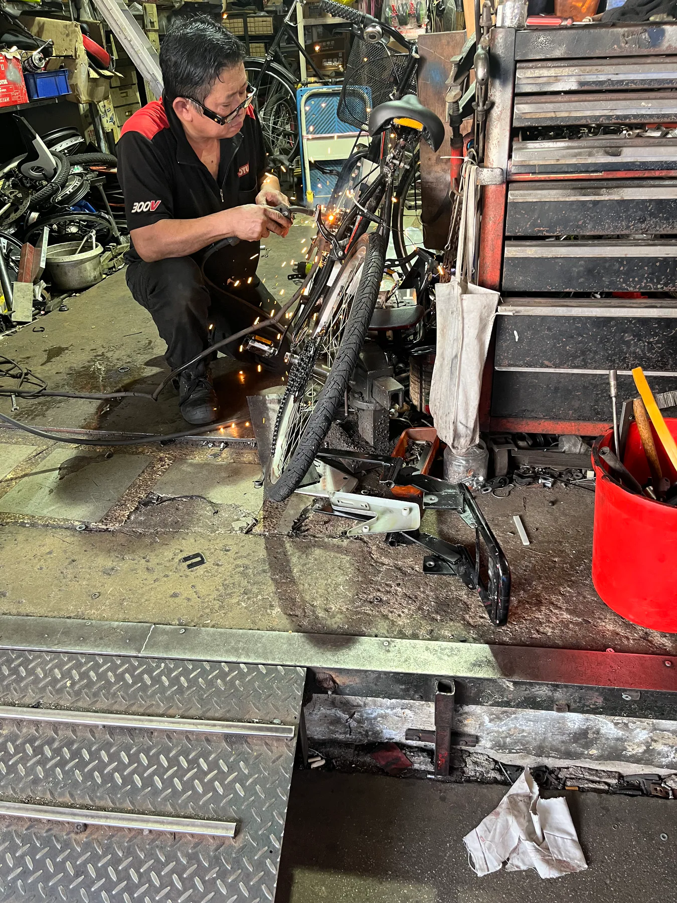 Flywheel-bike frame being worked on in a machine shop.