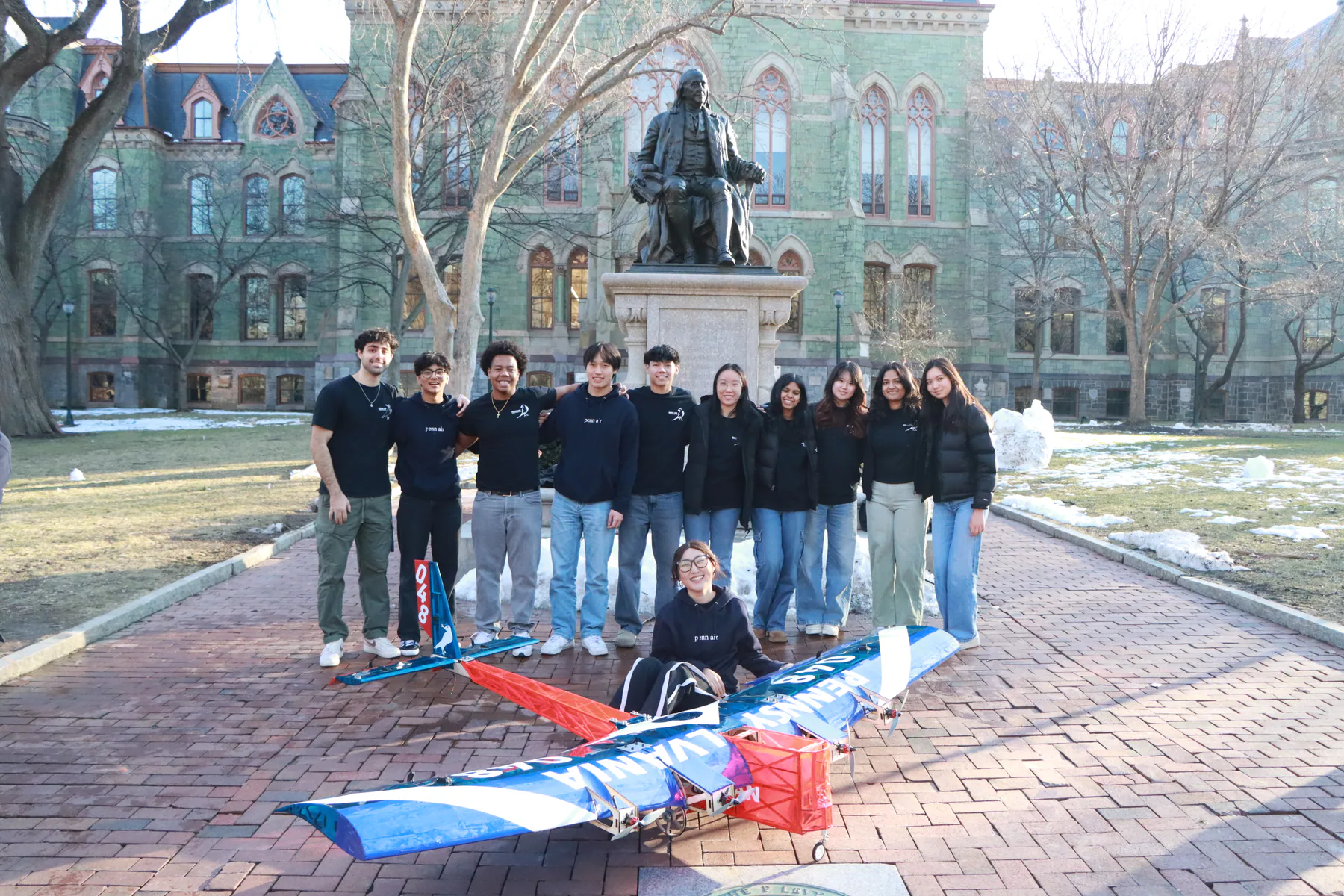 Regular Class mechanical team standing behind the completed Leviathan aircraft.