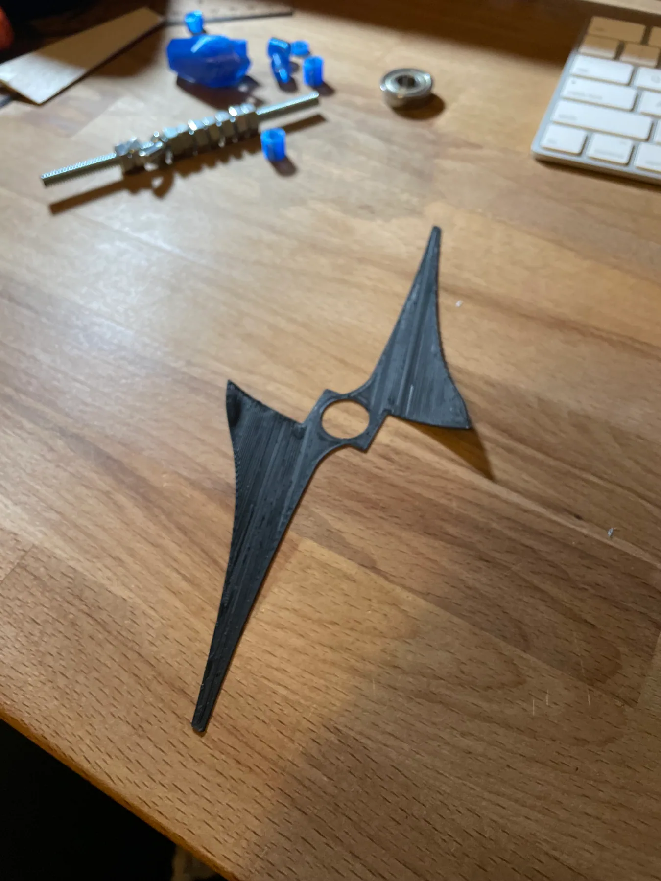 Black three-blade turbine prototype with test hardware.